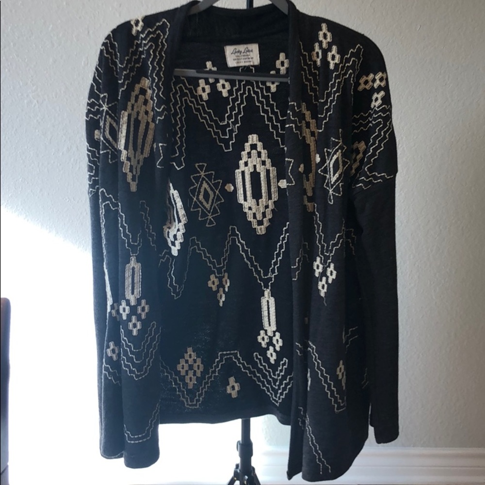 Gray and white lucky sweater